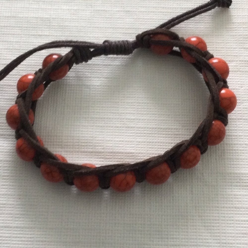 Woman’s Tied Stretch Bracelet made with leather rope and wood beads NWOT